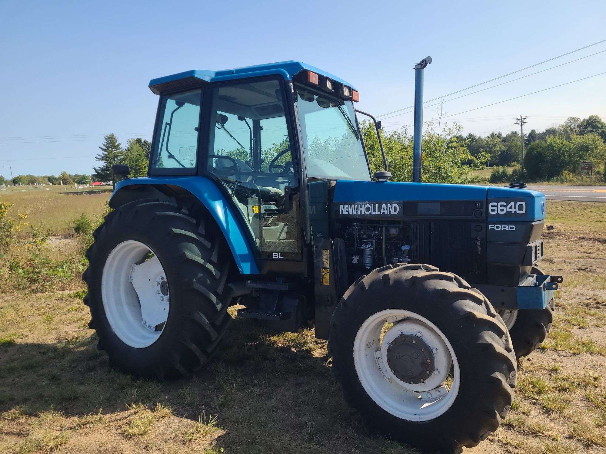 SOLD - 1997 New Holland 6640 Tractors with 84 HP | Tractor Zoom